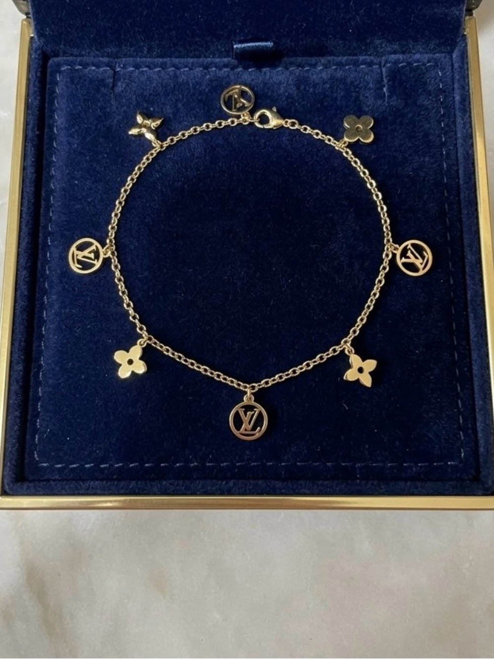 Gold plated Charm bracelet- Iconic Monogram Flower